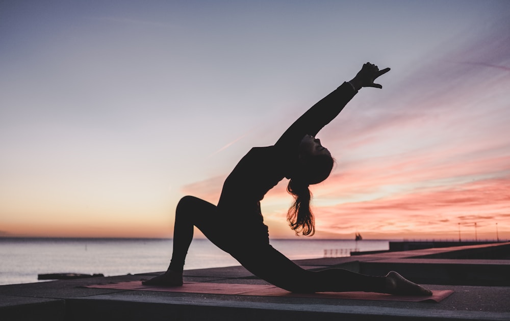 A peaceful outdoor yoga practice at sunset