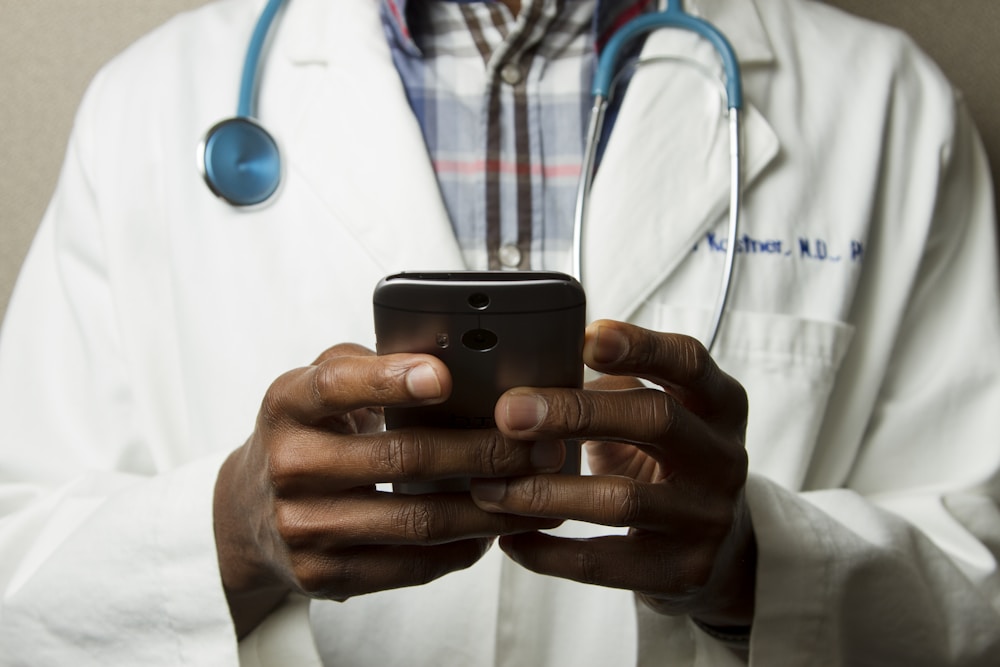 Healthcare professional holding a tablet